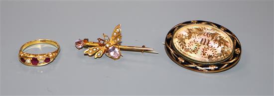 An 18ct, ruby and diamond five stone ring, a mourning brooch and a 9ct gem set bug brooch.